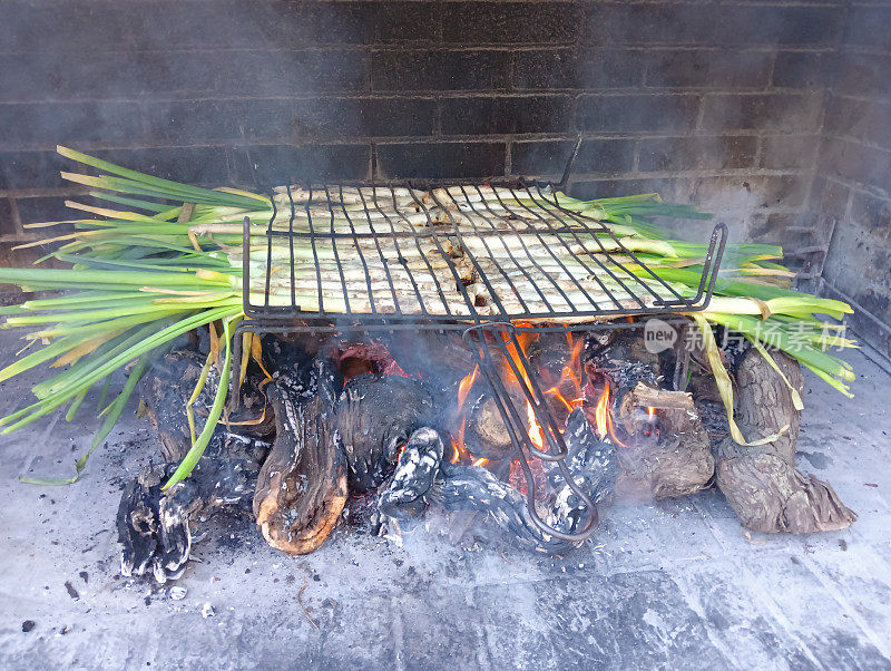 Calçots, a catalan spring onions. In winter, when the cold is going , we meet with friends to a "Calçotada". Is a bbq with this young onions with a delicious sauce.